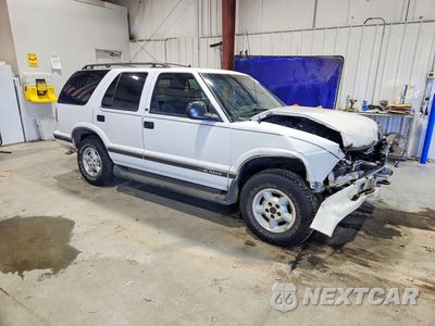 Czwarte zdjęcie samochodu z boku: 1997 CHEVROLET BLAZER VIN:1GNDT13WXV2238293 - miniatura