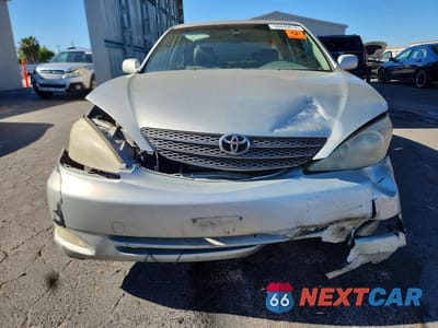 Piąte zdjęcie samochodu w środku: 2003 TOYOTA CAMRY XLE V6 VIN:JTDBF30K630142223 - miniatura
