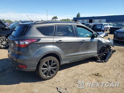 Trzecie zdjęcie samochodu z tyłu: 2017 FORD ESCAPE SE VIN:1FMCU9GD6HUD17599 - miniatura
