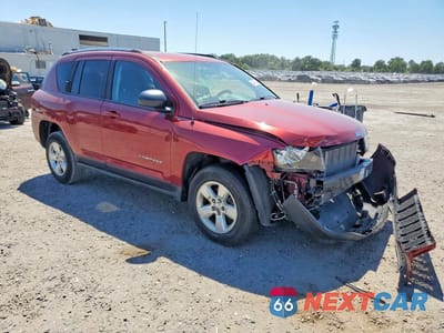 Czwarte zdjęcie samochodu z boku: 2014 JEEP COMPASS SPORT VIN:1C4NJCBA9ED843754 - miniatura