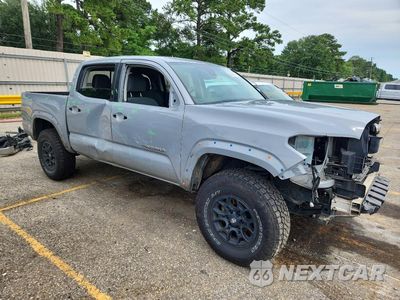 Czwarte zdjęcie samochodu z boku: 2021 TOYOTA TACOMA SR5 V6 VIN:5TFCZ5AN0MX257148 - miniatura