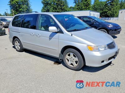 Czwarte zdjęcie samochodu z boku: 2001 HONDA ODYSSEY EX VIN:2HKRL186X1H520143 - miniatura