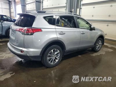Piąte zdjęcie samochodu w środku: 2017 TOYOTA RAV4 HYBRID XLE VIN:JTMRJREV6HD112528 - miniatura