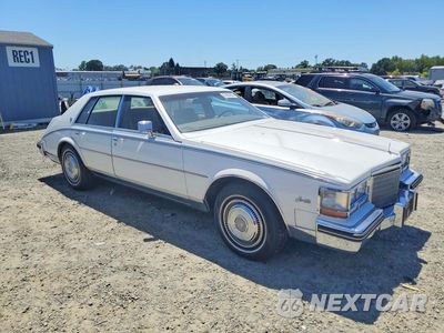 Czwarte zdjęcie samochodu z boku: 1984 CADILLAC SEVILLE VIN:1G6AS698XEE816950 - miniatura