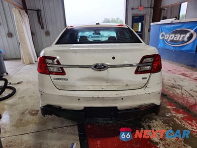 Zdjęcie 6 z 13 samochodu: 2015 FORD TAURUS POLICE INTERCEPTOR VIN:1FAHP2MK1FG157290 - miniatura