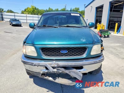 Piąte zdjęcie samochodu w środku: 1997 FORD F150 VIN:1FTDX17W8VKB83561 - miniatura