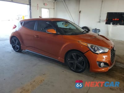 Czwarte zdjęcie samochodu z boku: 2013 HYUNDAI VELOSTER TURBO VIN:KMHTC6AE7DU143328 - miniatura