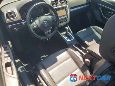 Zdjęcie 8 z 12 samochodu: 2012 VOLKSWAGEN EOS KOMFORT VIN:WVWBW7AH4CV001518 - miniatura