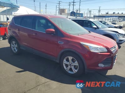 Czwarte zdjęcie samochodu z boku: 2016 FORD ESCAPE SE VIN:1FMCU0G71GUB60827 - miniatura