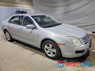 Czwarte zdjęcie samochodu z boku: 2009 FORD FUSION SE VIN:3FAHP07189R135503 - miniatura
