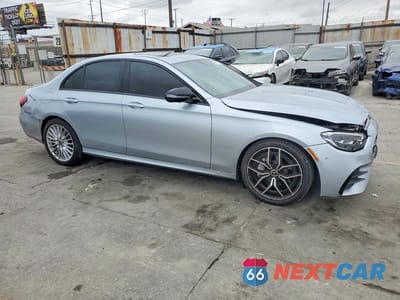 Czwarte zdjęcie samochodu z boku: 2021 MERCEDES-BENZ E 350 VIN:W1KZF8DB3MA930271 - miniatura