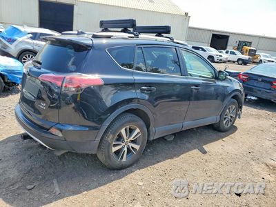Trzecie zdjęcie samochodu z tyłu: 2016 TOYOTA RAV4 HV XLE VIN:JTMRJREV0GD038733 - miniatura