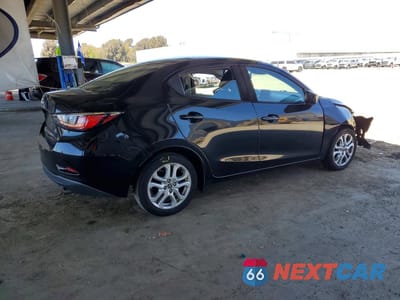 Trzecie zdjęcie samochodu z tyłu: 2017 TOYOTA YARIS IA BASE VIN:3MYDLBYV3HY180999 - miniatura