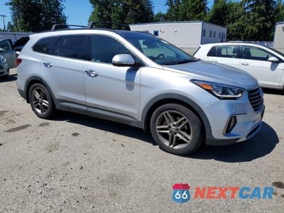 Czwarte zdjęcie samochodu z boku: 2017 HYUNDAI SANTA FE SE ULTIMATE VIN:KM8SRDHF6HU253693 - miniatura
