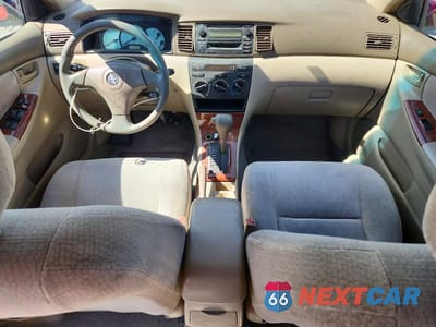 Zdjęcie 8 z 12 samochodu: 2003 TOYOTA COROLLA LE VIN:1NXBR38E43Z177854 - miniatura