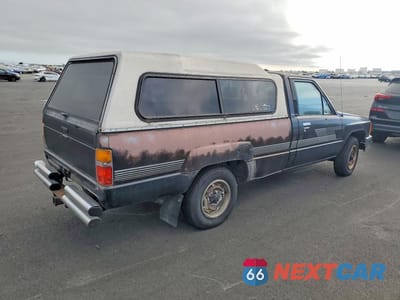 Trzecie zdjęcie samochodu z tyłu: 1987 TOYOTA PICKUP 1/2 TON RN55 DLX VIN:JT4RN55D7H0242751 - miniatura