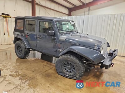 Czwarte zdjęcie samochodu z boku: 2016 JEEP WRANGLER UNLIMITED SAHARA VIN:1C4BJWEG9GL239716 - miniatura