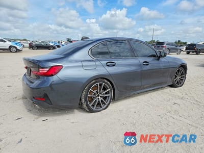 Trzecie zdjęcie samochodu z tyłu: 2021 BMW 330I VIN:3MW5R1J04M8B70158 - miniatura