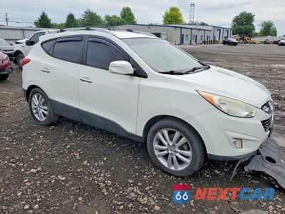Czwarte zdjęcie samochodu z boku: 2012 HYUNDAI TUCSON LIMITED VIN:KM8JUCAC0CU405268 - miniatura