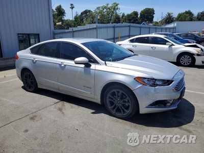 Czwarte zdjęcie samochodu z boku: 2018 FORD FUSION SE HYBRID VIN:3FA6P0LU6JR103239 - miniatura