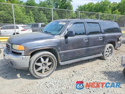 2002 GMC YUKON XL K1500 3GKFK16Z42G272635 - główne zdjęcie licytacji z USA - miniatura