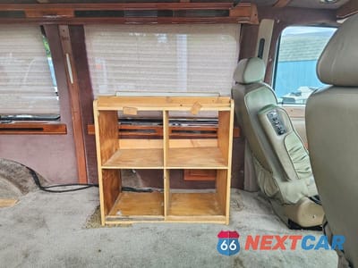 Zdjęcie 11 z 13 samochodu: 1997 FORD ECONOLINE E150 VAN VIN:1FDEE14L7VHA27234 - miniatura
