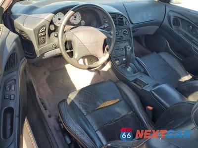 Zdjęcie 8 z 12 samochodu: 1999 MITSUBISHI ECLIPSE GS VIN:4A3AK44Y4XE056507 - miniatura
