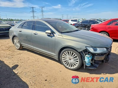 Czwarte zdjęcie samochodu z boku: 2017 LINCOLN MKZ HYBRID RESERVE VIN:3LN6L5MU2HR635059 - miniatura