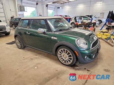 Czwarte zdjęcie samochodu z boku: 2012 MINI COOPER S VIN:WMWSV3C5XCTY29855 - miniatura