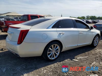 Trzecie zdjęcie samochodu z tyłu: 2013 CADILLAC XTS PREMIUM COLLECTION VIN:2G61S5S36D9116515 - miniatura