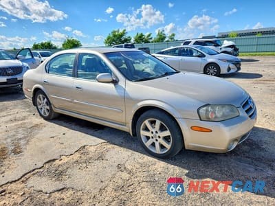 Czwarte zdjęcie samochodu z boku: 2003 NISSAN MAXIMA GXE VIN:JN1DA31A63T431813 - miniatura
