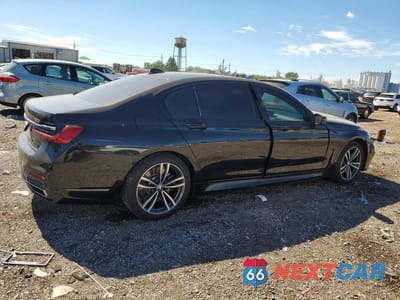 Trzecie zdjęcie samochodu z tyłu: 2021 BMW 750 XI VIN:WBA7U2C04MCE60972 - miniatura