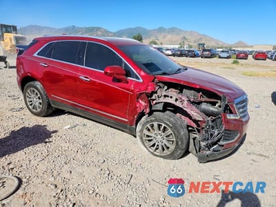 Czwarte zdjęcie samochodu z boku: 2019 CADILLAC XT5 LUXURY VIN:1GYKNDRSXKZ286616 - miniatura