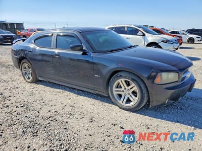Czwarte zdjęcie samochodu z boku: 2006 DODGE CHARGER R/T VIN:2B3KA53H26H140156 - miniatura