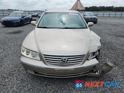 Piąte zdjęcie samochodu w środku: 2006 HYUNDAI AZERA SE VIN:KMHFC46F36A050524 - miniatura