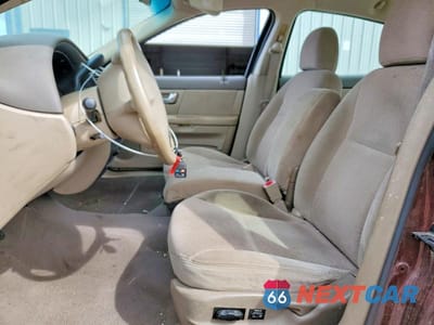Zdjęcie 7 z 12 samochodu: 2000 FORD TAURUS SES VIN:1FAFP5525YG146528 - miniatura