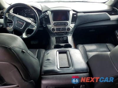 Zdjęcie 8 z 13 samochodu: 2015 GMC YUKON SLT VIN:1GKS1BKC5FR243286 - miniatura