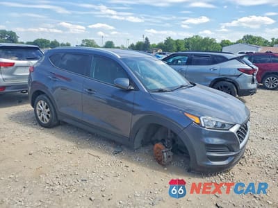 Czwarte zdjęcie samochodu z boku: 2019 HYUNDAI TUCSON VALUE VIN:KM8J3CA4XKU020150 - miniatura