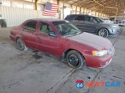 Czwarte zdjęcie samochodu z boku: 2001 TOYOTA COROLLA CE VIN:1NXBR12E91Z457859 - miniatura