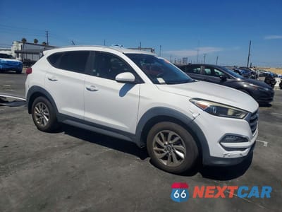 Czwarte zdjęcie samochodu z boku: 2017 HYUNDAI TUCSON SE VIN:KM8J33A40HU297530 - miniatura