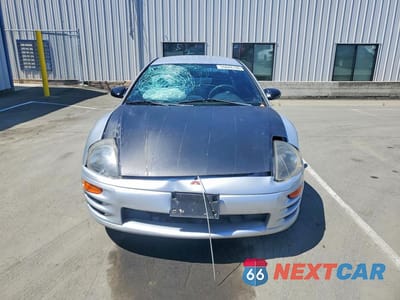 Piąte zdjęcie samochodu w środku: 2000 MITSUBISHI ECLIPSE RS VIN:4A3AC34G8YE128616 - miniatura