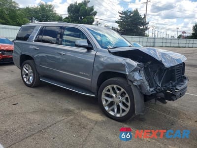 Czwarte zdjęcie samochodu z boku: 2020 GMC YUKON DENALI VIN:1GKS2CKJXLR194194 - miniatura
