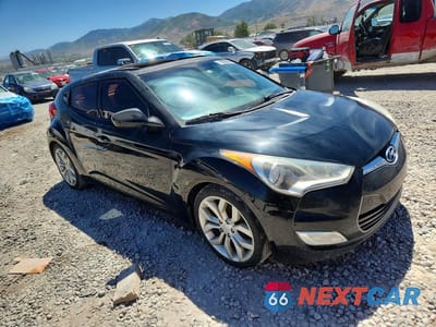Czwarte zdjęcie samochodu z boku: 2012 HYUNDAI VELOSTER BASE VIN:KMHTC6AD8CU061727 - miniatura