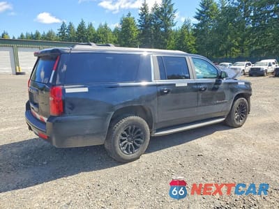 Trzecie zdjęcie samochodu z tyłu: 2019 CHEVROLET SUBURBAN C1500 LT VIN:1GNSCHKC0KR130159 - miniatura
