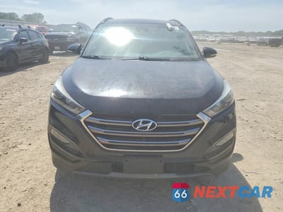 Piąte zdjęcie samochodu w środku: 2016 HYUNDAI TUCSON LIMITED VIN:KM8J33A26GU077385 - miniatura