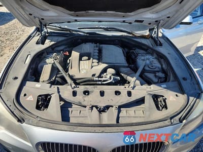 Zdjęcie 11 z 12 samochodu: 2012 BMW 740 LI VIN:WBAKB4C5XCC575384 - miniatura