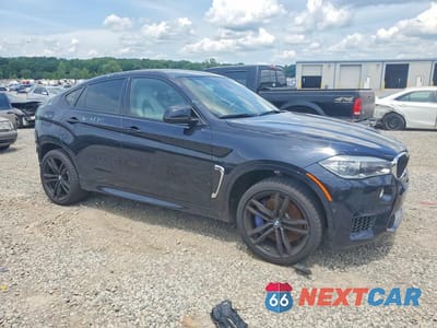 Czwarte zdjęcie samochodu z boku: 2019 BMW X6 M VIN:5YMKW8C50KLR38425 - miniatura