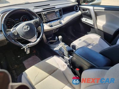 Zdjęcie 8 z 14 samochodu: 2016 TOYOTA RAV4 HV XLE VIN:JTMRJREV3GD007833 - miniatura