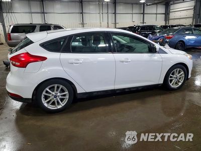 Trzecie zdjęcie samochodu z tyłu: 2016 FORD FOCUS SE VIN:1FADP3K23GL258329 - miniatura