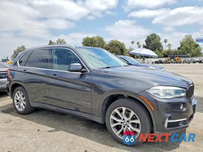 Czwarte zdjęcie samochodu z boku: 2014 BMW X5 SDRIVE35I VIN:5UXKR2C56E0H33793 - miniatura